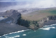 Oblique aerial photo of Ingolfshofdi volcanic headland anchoring eastern end of Skeidararsandur