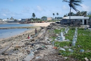 A cemetery by the eroded coastline, Majuro, Marshall Islands.