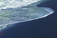 Black volcanic sand beach, Tahiti