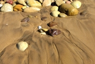 Gold colored beach sand, Salema, the Algarve, Portugal