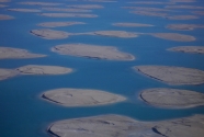 Dubai, sand dredged artificial islands.