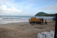trucks-sand-bags-beach