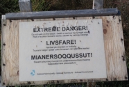 Warning sign above Sermermiut Beach